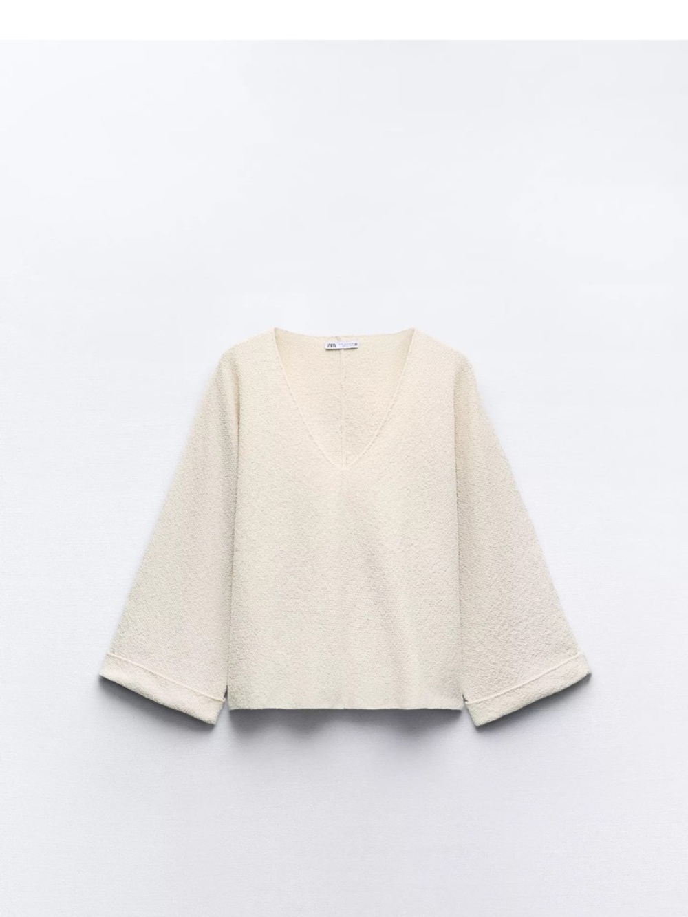 Cutwork  V-Neck Sweater
